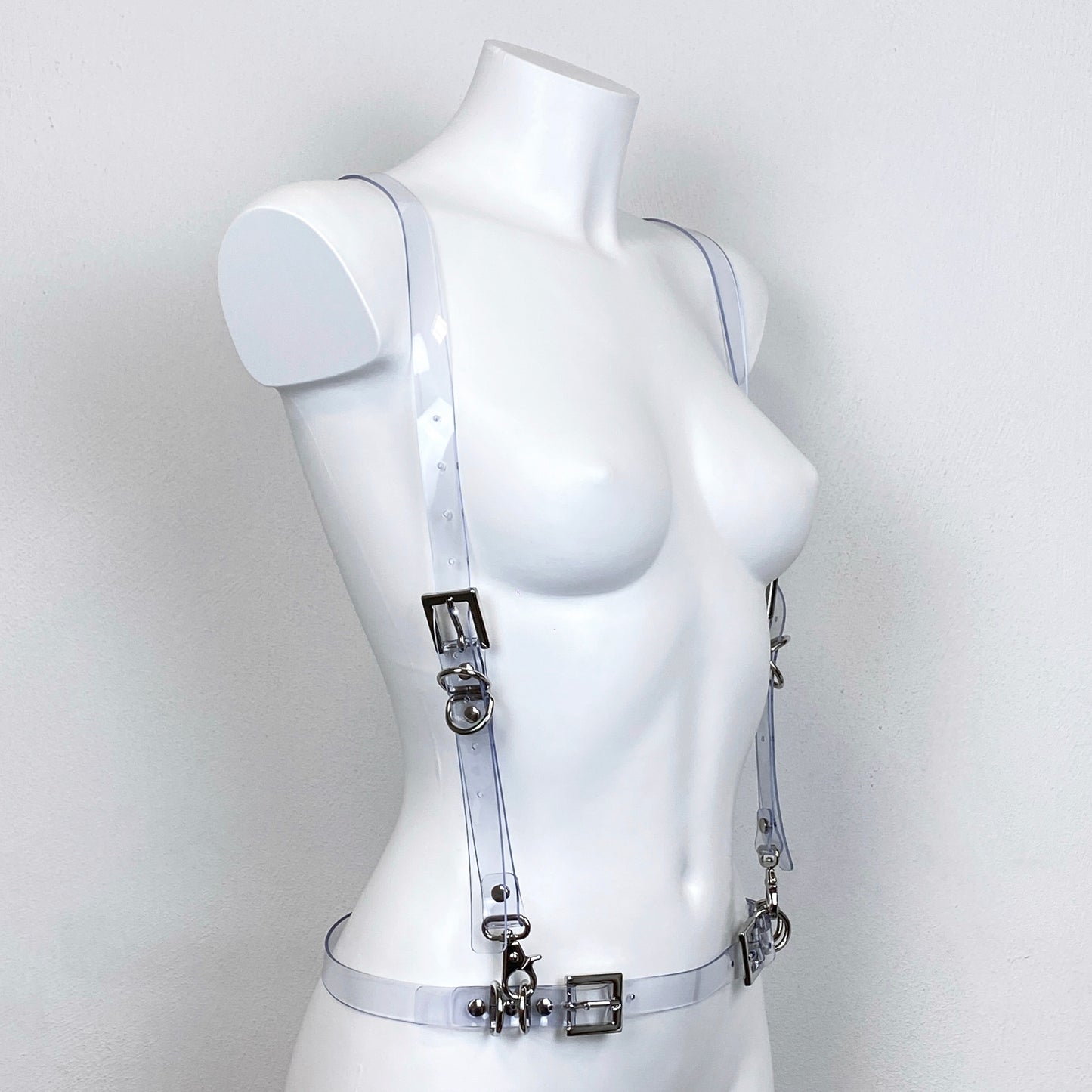 Suspenders transparent PVC harness with metallic ring and buckles